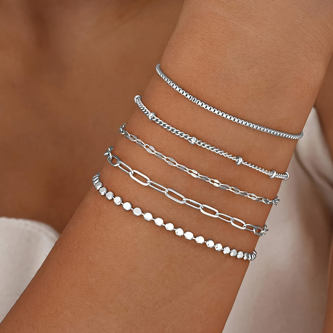 Adjustable delicate gold chain bracelet set for women. Elegant fashion jewelry, perfect gift for her.
