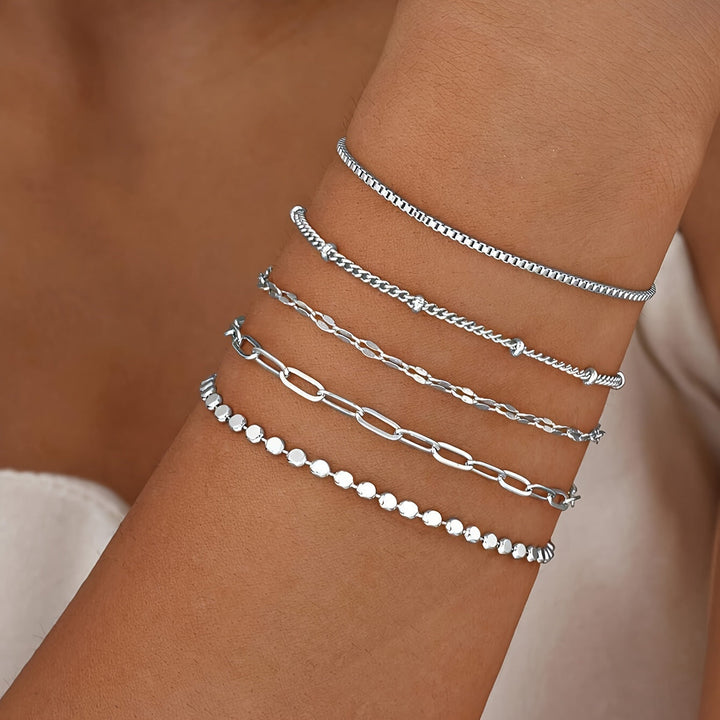 Adjustable delicate gold chain bracelet set for women. Elegant fashion jewelry, perfect gift for her.