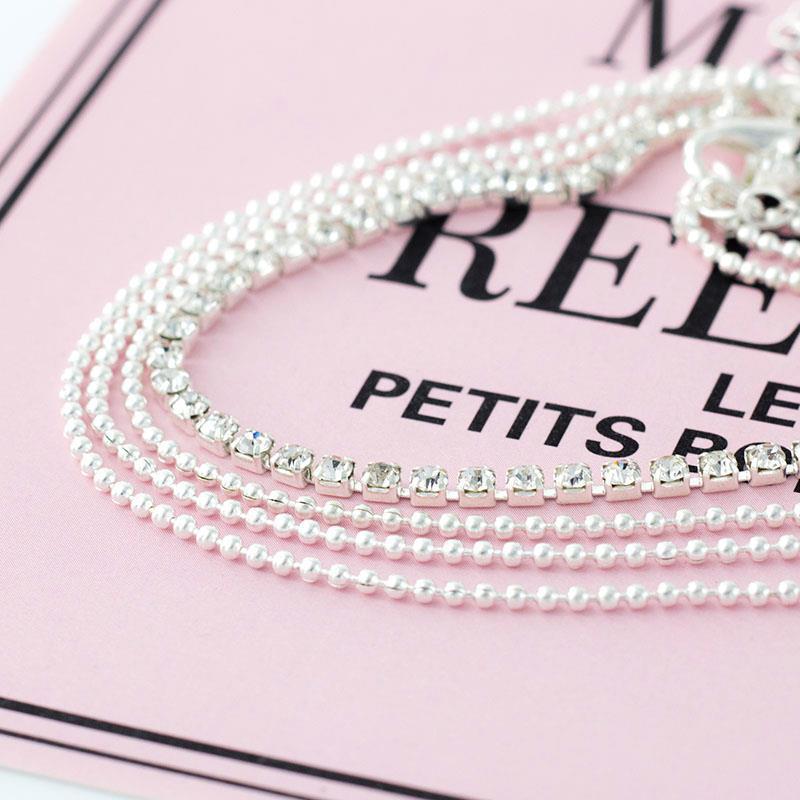 Gold-tone delicate multi-chain anklet, an elegant women's ankle bracelet, ideal for summer outfits & gifts.