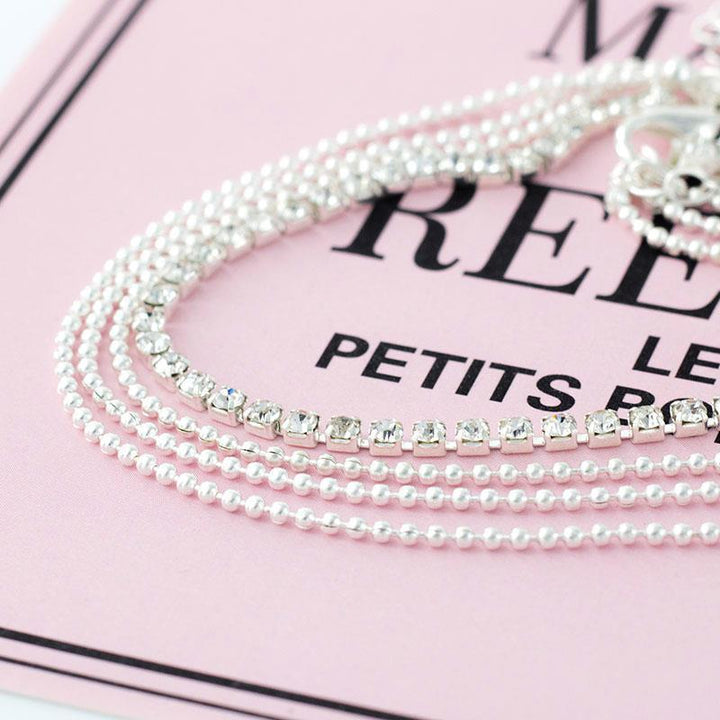 Gold-tone delicate multi-chain anklet, an elegant women's ankle bracelet, ideal for summer outfits & gifts.