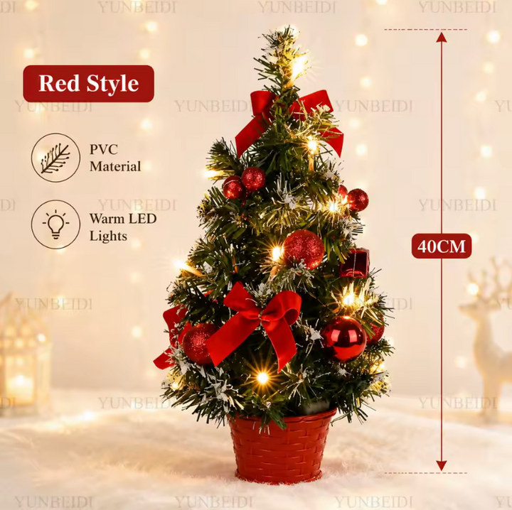 Small pre-lit tabletop Christmas tree, ideal festive decor and a great holiday gift for desks or shelves.