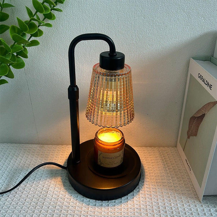 Decorative electric candle warmer lamp for creating ambiance. Dimmable light & timer for safe, flameless scent.