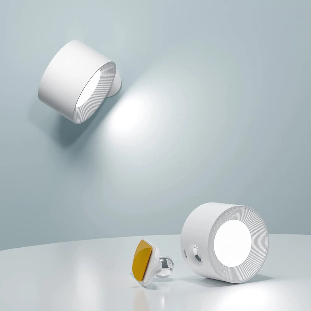 Dimmable, rechargeable, rotatable wireless wall light. Modern magnetic design for flexible home accent or task lighting.