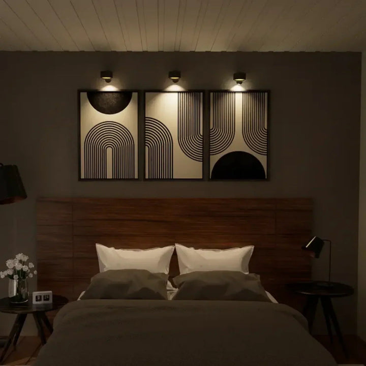 Rechargeable wireless wall light, rotatable head for targeted dimmable lighting. Ideal for modern home decor.