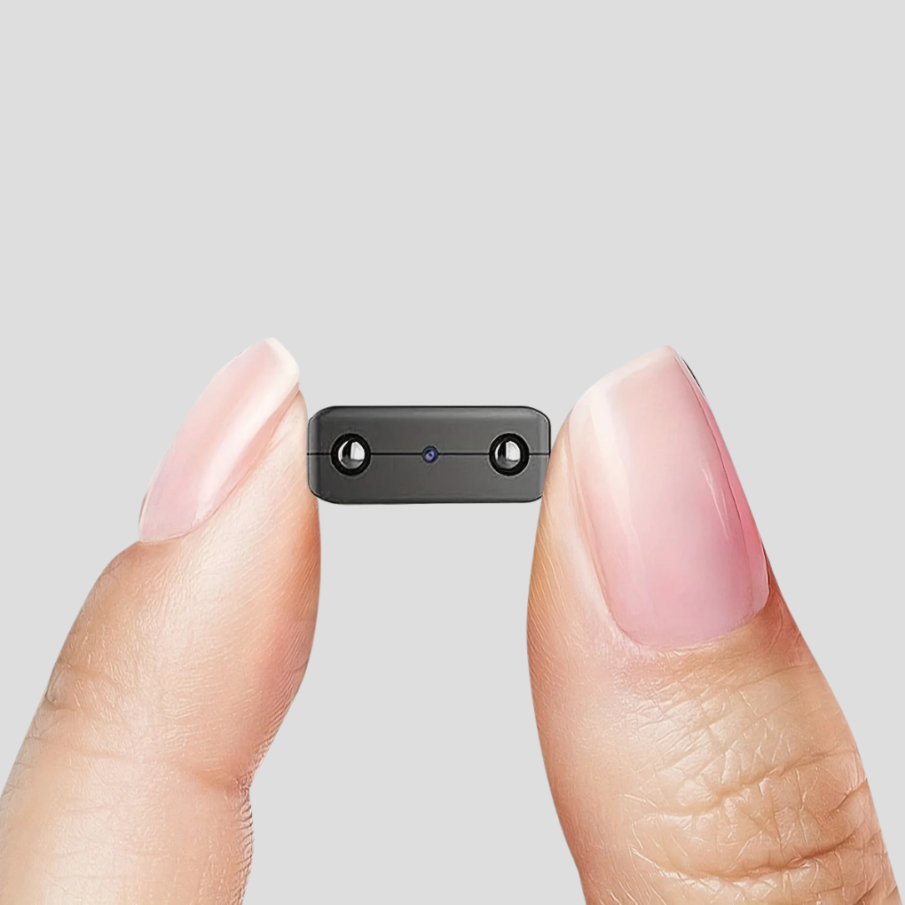 Discreet 1080p mini security camera for covert surveillance. Ideal for home or office monitoring.