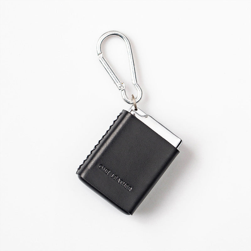Unisex portable ashtray for odor-free travel. Features a secure lid & durable design, perfect for discreet outdoor use.
