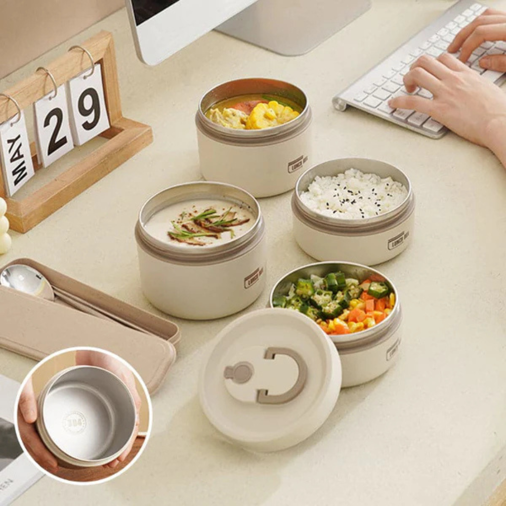 Insulated hot lunch container, keeps food warm for hours, great for school or work.