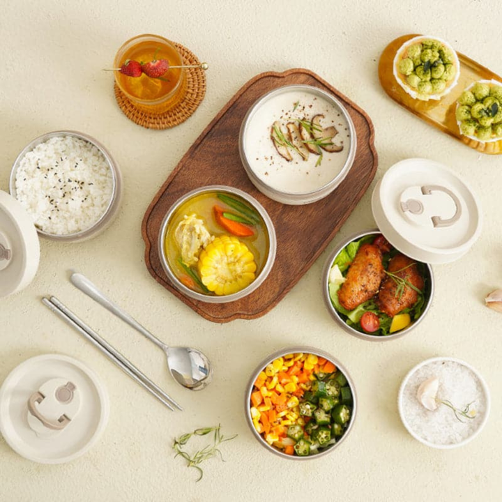 Leak-resistant double-wall food container for secure & portable meal transport.
