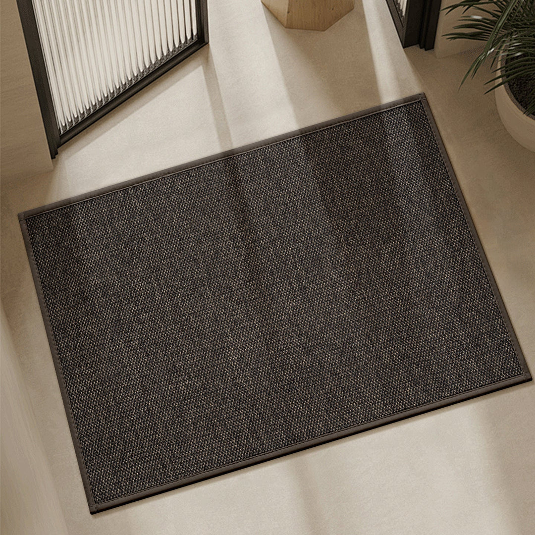 Washable entryway doormat with anti-slip backing. Durable dirt trap mat for busy home & office use.