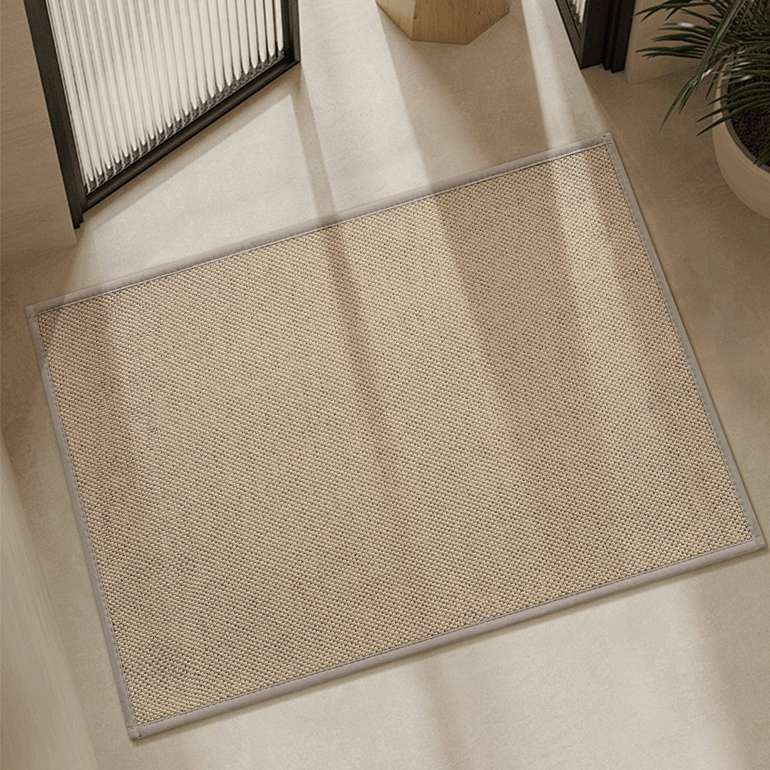 Heavy-duty anti-slip floor mat for entryway safety. Durable, washable doormat designed to trap dirt and moisture.