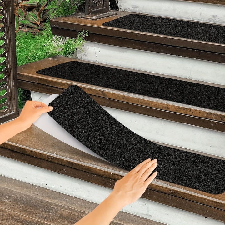 Durable black rubber anti-slip tread strips providing extra grip for stairs, ensuring stair safety indoors & outdoors.