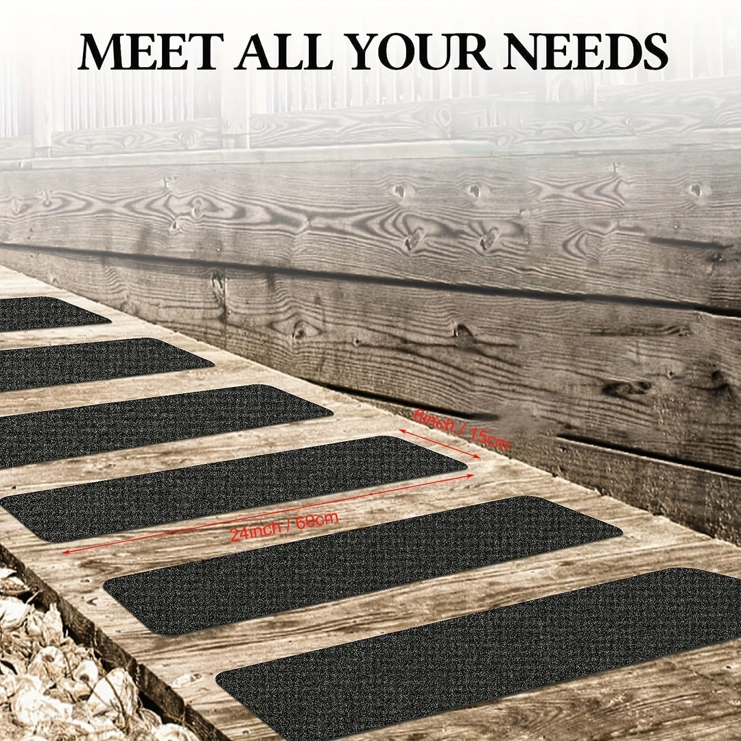 Textured black rubber anti-slip tread strips, designed for maximum grip on slippery stairs and high-traffic areas.