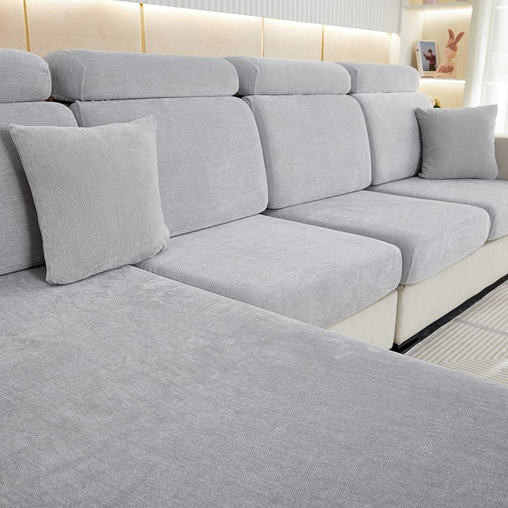 Luxurious chenille sectional cover for sofas. Durable, washable furniture protector for modern living rooms.