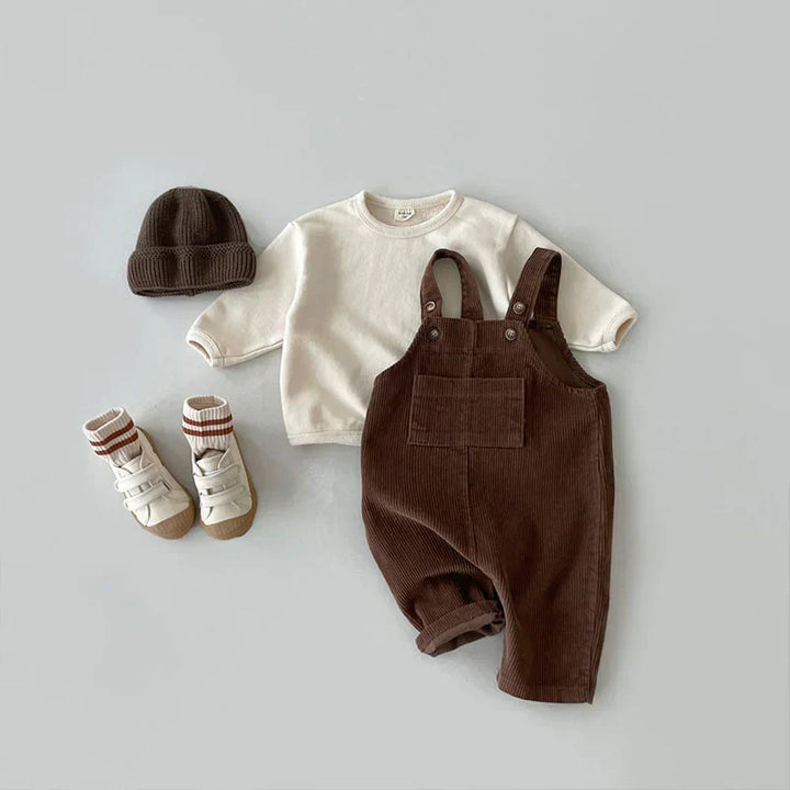 Durable corduroy overalls for active kids, perfect for playtime and everyday adventures.