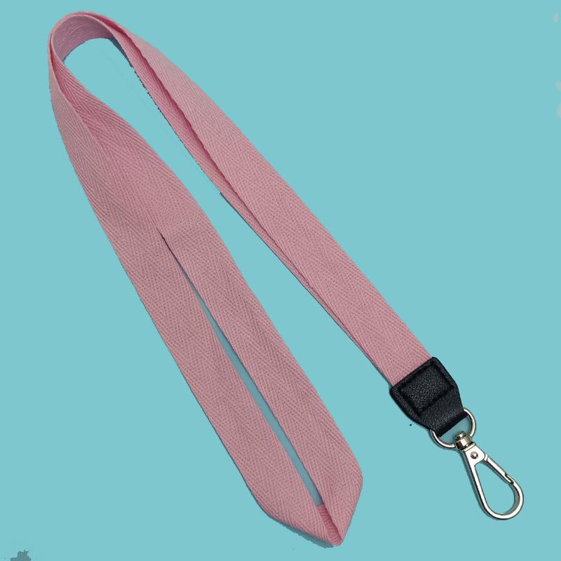 Reliable fabric lanyard for travel, holding ID, hotel cards, and keys securely. Unisex, versatile & practical.