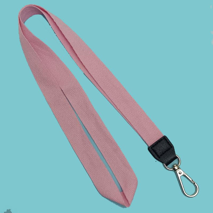 Reliable fabric lanyard for travel, holding ID, hotel cards, and keys securely. Unisex, versatile & practical.