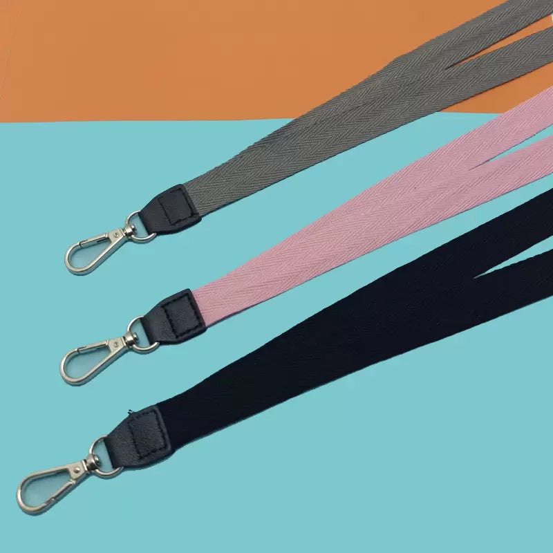 Unisex fabric lanyard for secure ID badge and key holding. Essential office & travel accessory, very durable.