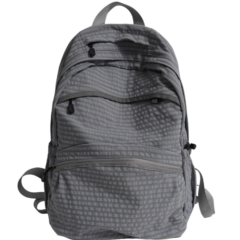 Spacious black multi-purpose school backpack, weather-resistant & stylish for travel, college, work, or daily use.