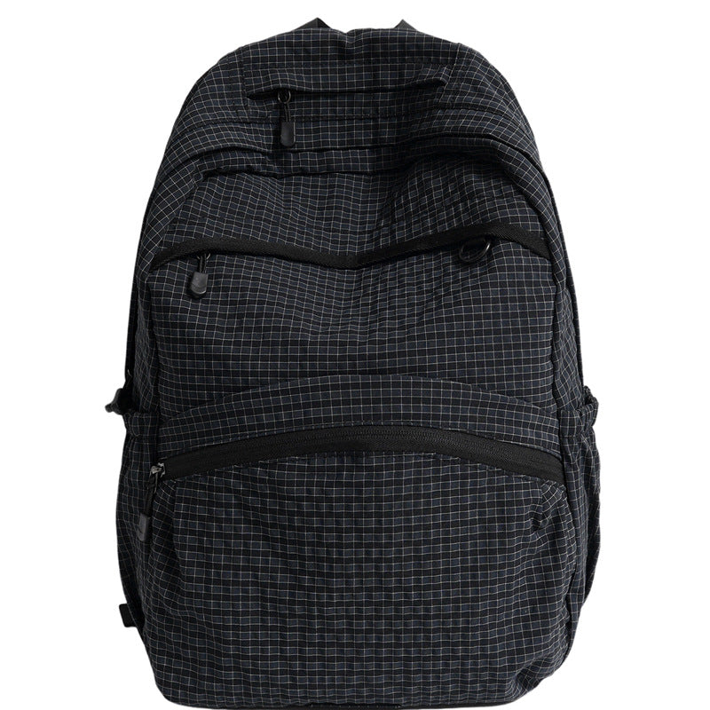 Structured brown everyday backpack with multiple compartments & padded straps, perfect for school, work, or travel.
