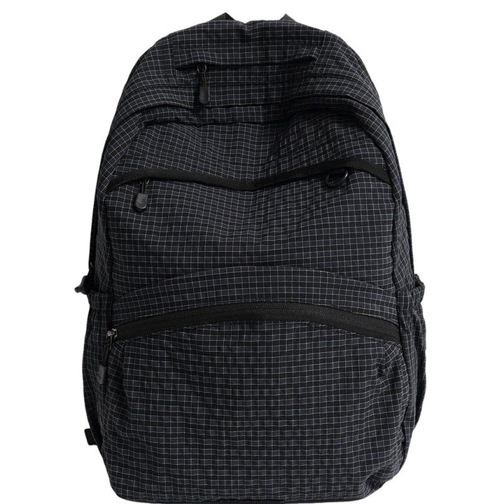 Structured brown everyday backpack with multiple compartments & padded straps, perfect for school, work, or travel.