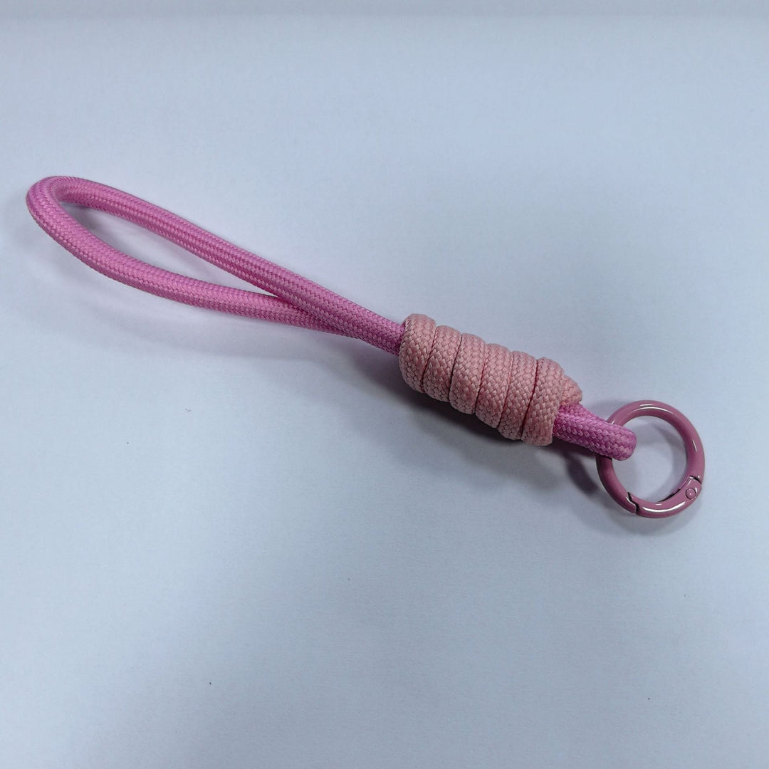 Versatile key clip, durable and secure for bags, belts, and keys.