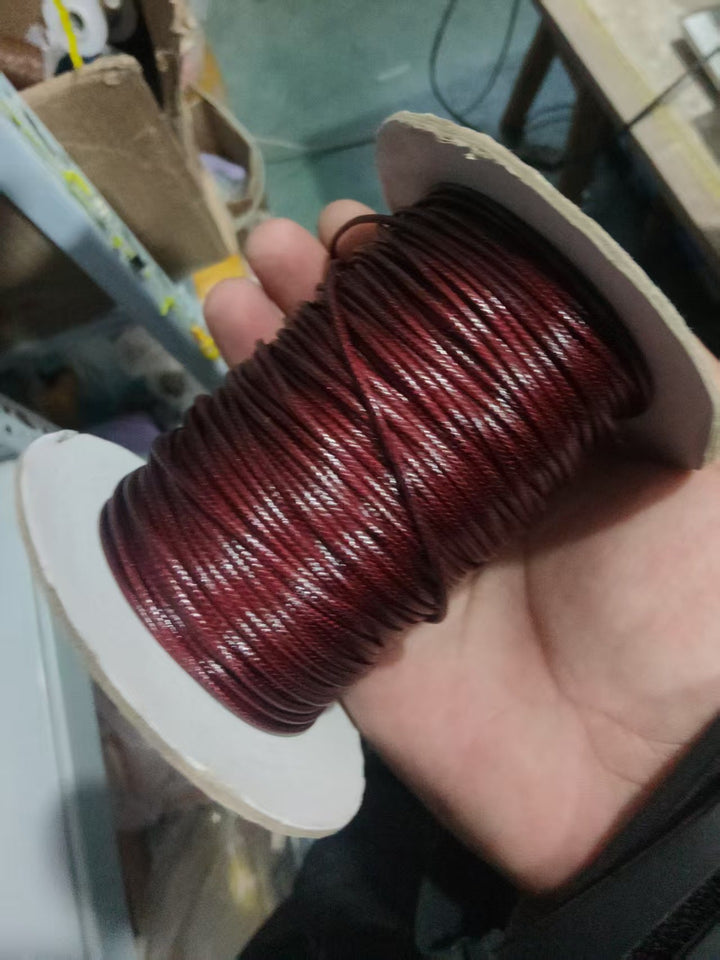 Essential durable crafting thread spool for your next DIY craft project, sewing or jewelry making.