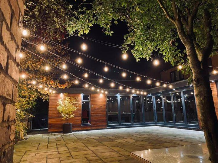 Heavy-duty waterproof LED string lights for all-weather outdoor use, ideal for commercial & event lighting.