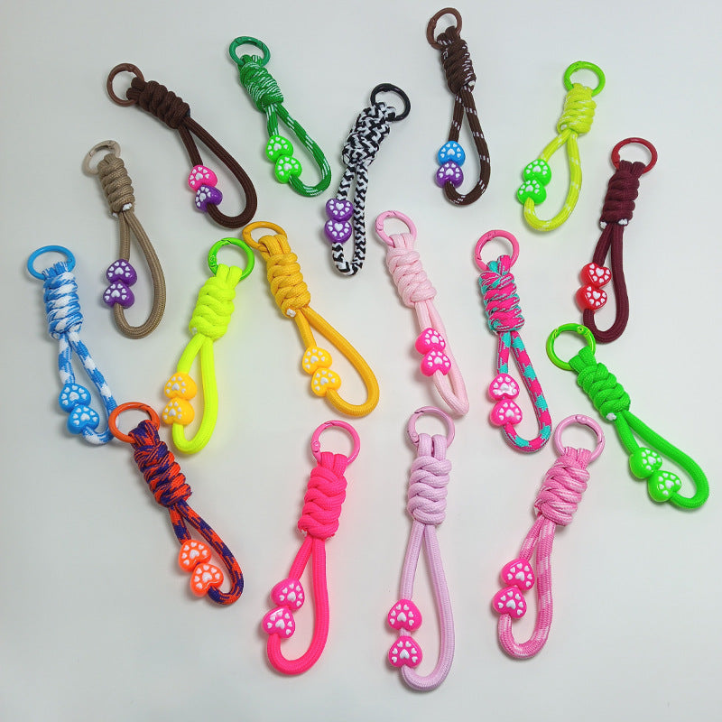 Durable paracord keychain; multi-use survival tool for outdoor adventures & EDC.