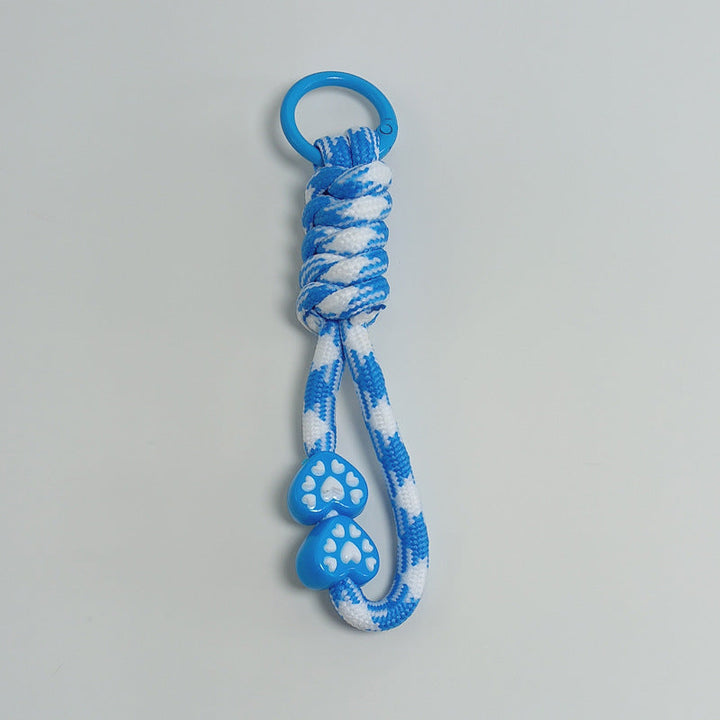 Outdoor essential: durable paracord keychain, a survival tool for explorers & adventurers.
