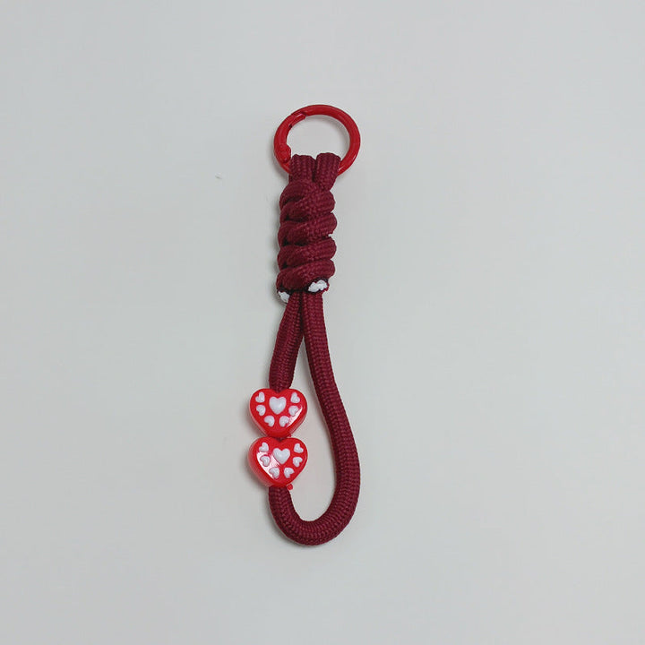 Paracord survival keychain, a tough key holder and emergency tool for wilderness trips.