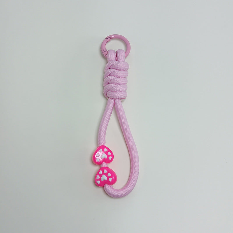 Camping accessory: durable paracord keychain, an essential survival tool for hikers.