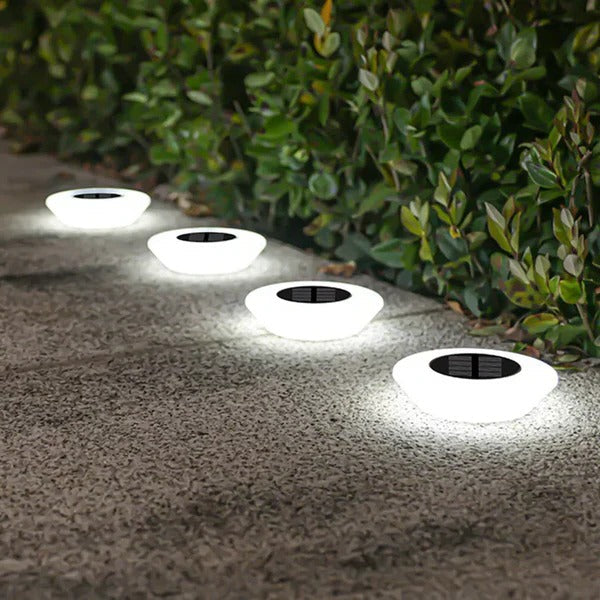 Weatherproof & rust-proof solar LED pathway lights, ideal for durable all-season outdoor garden landscape.