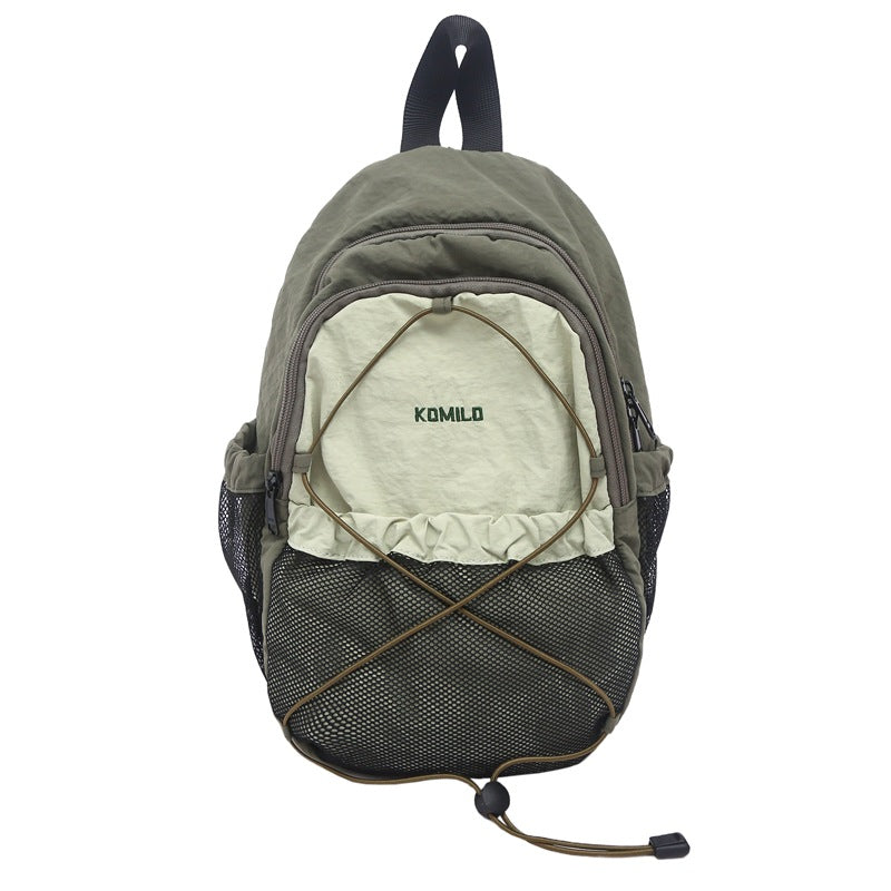 Durable unisex hiking backpack for outdoor adventures. Versatile travel pack with water-resistant fabric, ideal for camping.