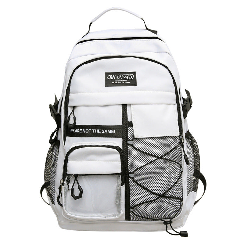 Stylish grey multi-compartment backpack, featuring front pockets for organization, ideal for travel and daily essentials.