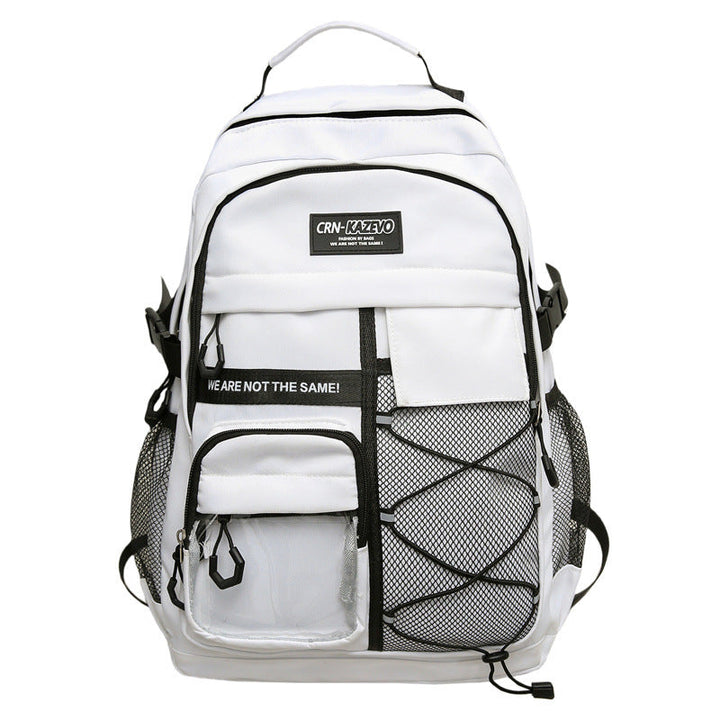Stylish grey multi-compartment backpack, featuring front pockets for organization, ideal for travel and daily essentials.