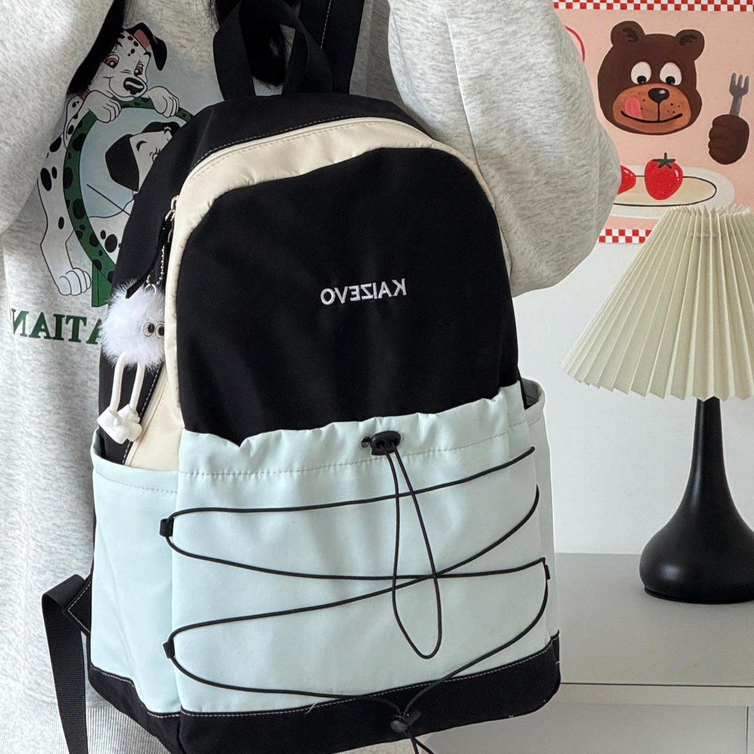 Functional black unisex daypack for outdoor adventures & everyday travel. Spacious, ergonomic design for comfort & utility.