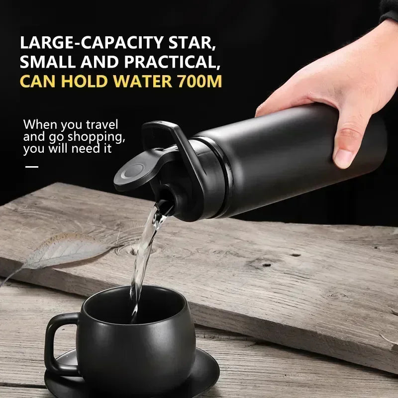 Stainless steel reusable insulated water bottle for outdoor adventures.