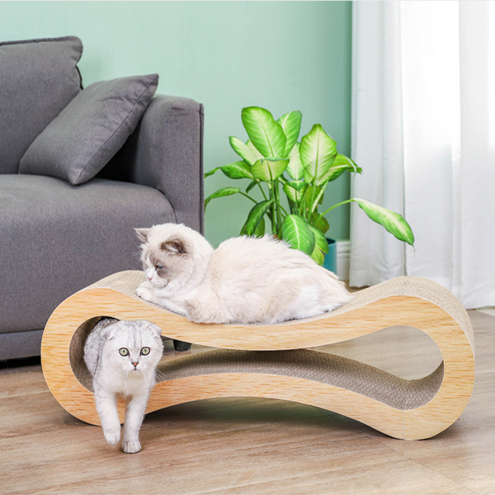 Eco-friendly cat scratching lounge and bed. Sustainable feline wellness pet accessory, protecting furniture with playful design.