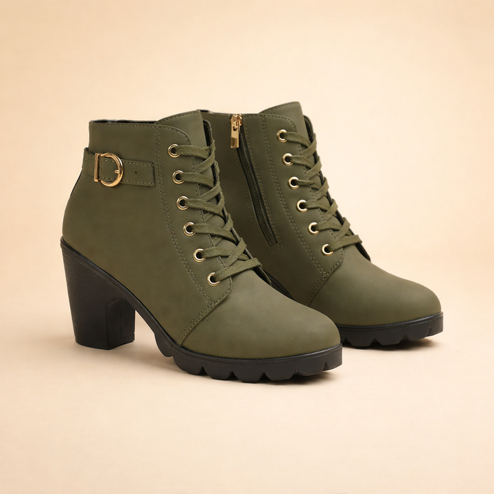 Women's edgy black chunky heel ankle boots with lace-up front and stylish buckle, ideal for winter wear.