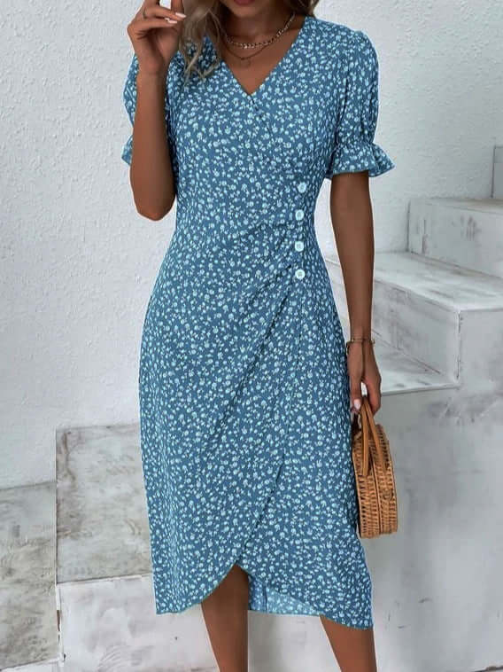 Elegant women's summer midi dress, perfect for a chic and relaxed warm-weather look.