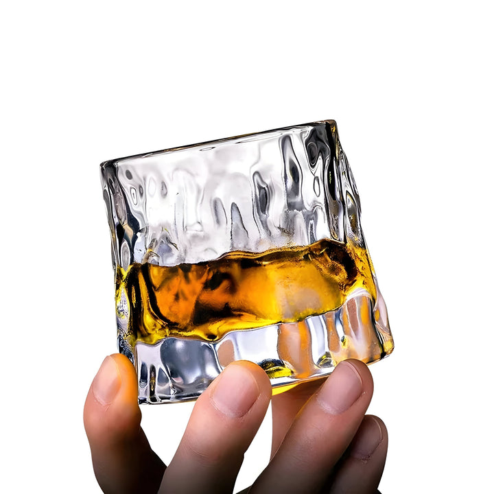 Elegant 360° rotating crystal tasting glass for spirits, whisky & cocktails. Unique home bar drinkware.