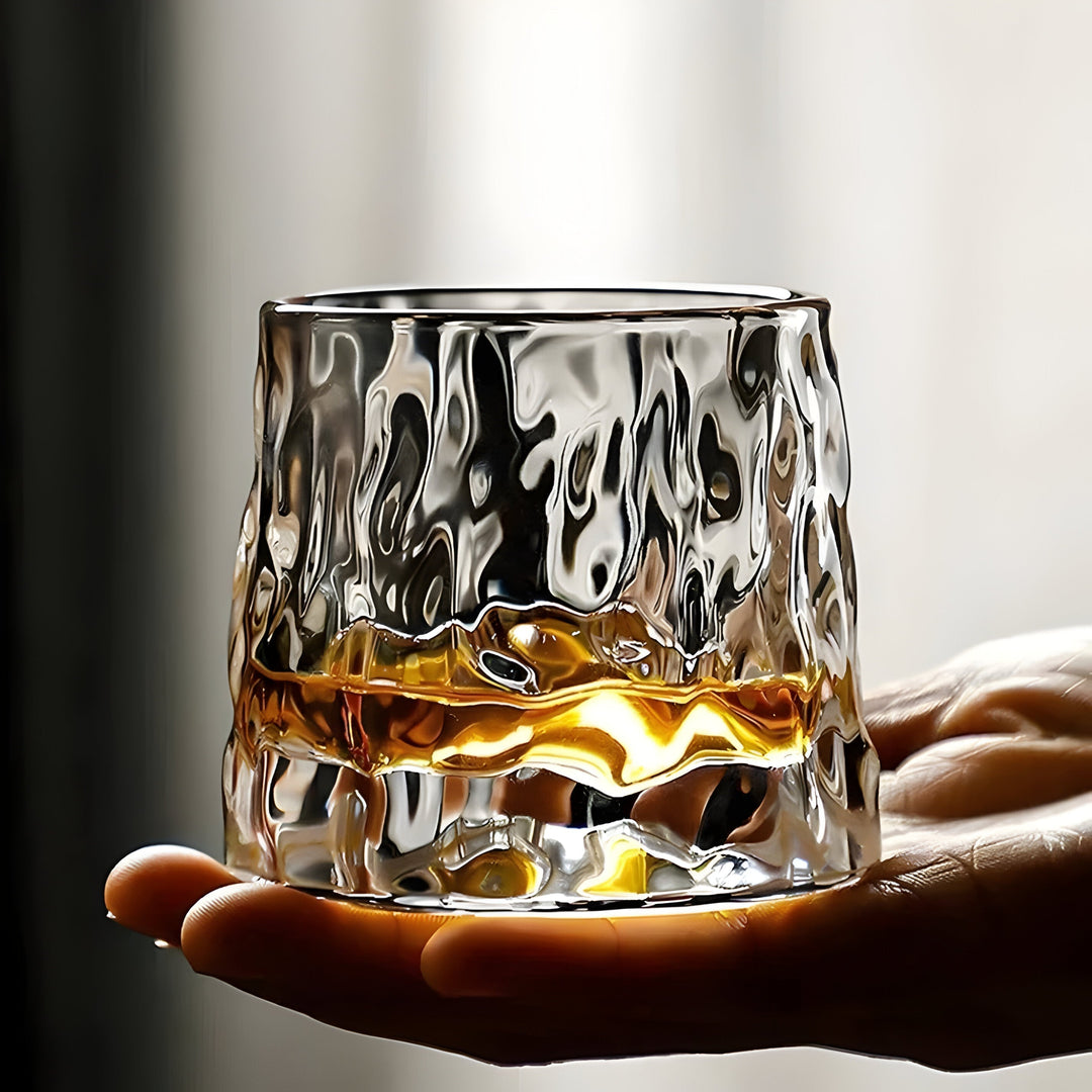 Premium 360° rotating crystal tasting glass for whisky, spirits & cocktails. Stylish home bar drinkware.