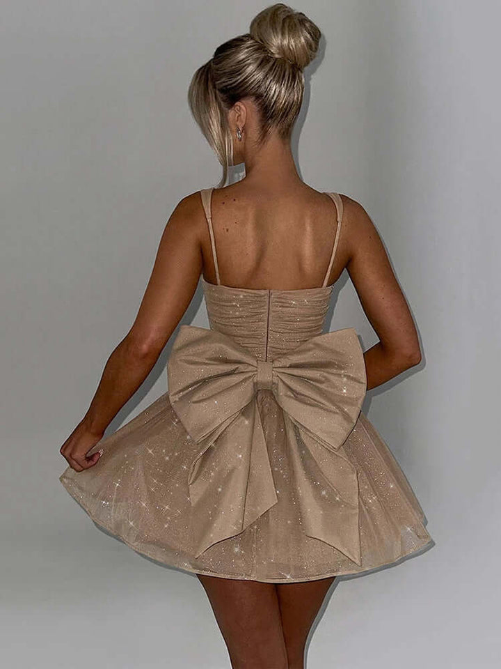 Chic knee-length A-line dress with sophisticated bow back, great for wedding guests, prom, or formal events.