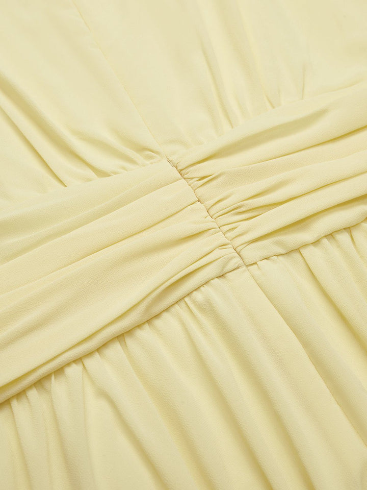 Flowing A-line wedding guest dress, elegant silhouette and design.
