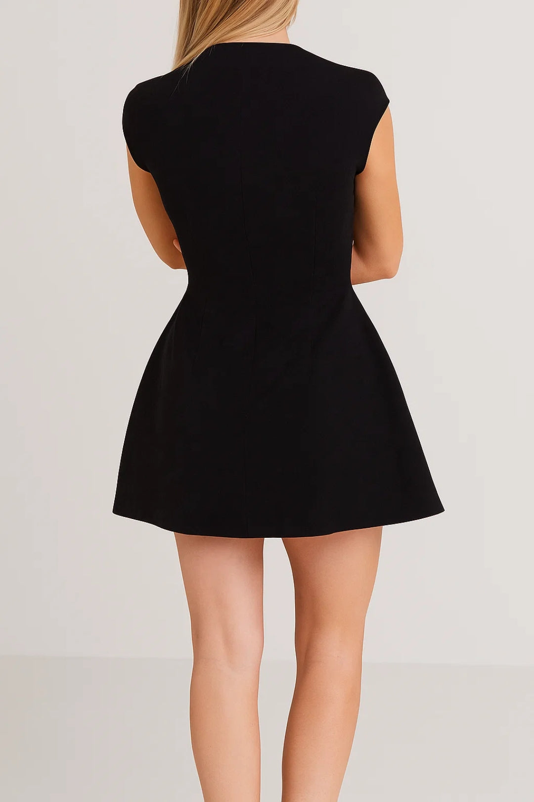 Crisp white A-line mini dress, an elegant women's spring/summer dress with a refined stand-up collar detail.