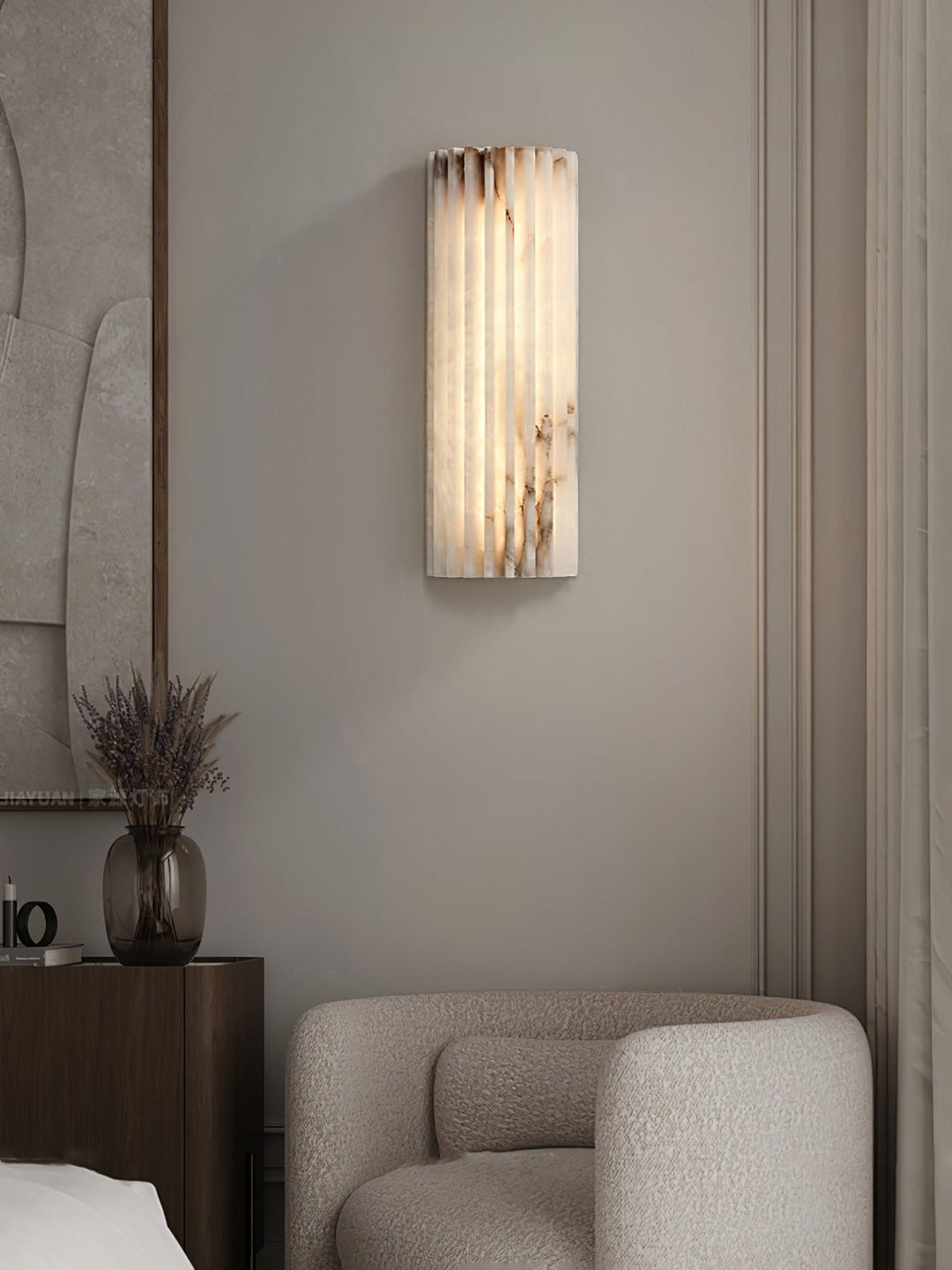 Elegant alabaster hallway wall light, modern LED sconce illuminating a refined indoor space.