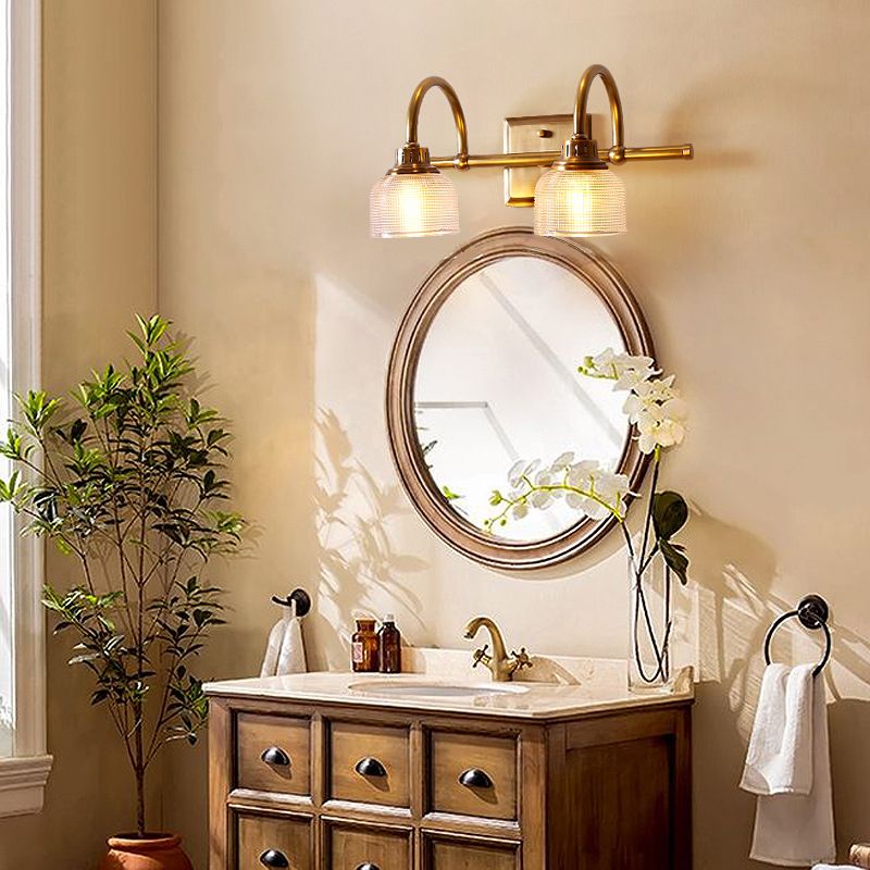 Modern classic antique brass wall lamp featuring diffused light and elegant design.