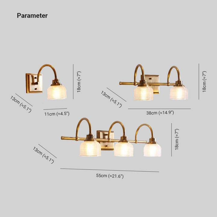 Stylish antique brass wall sconce for living room decor, emits soft, diffused light.
