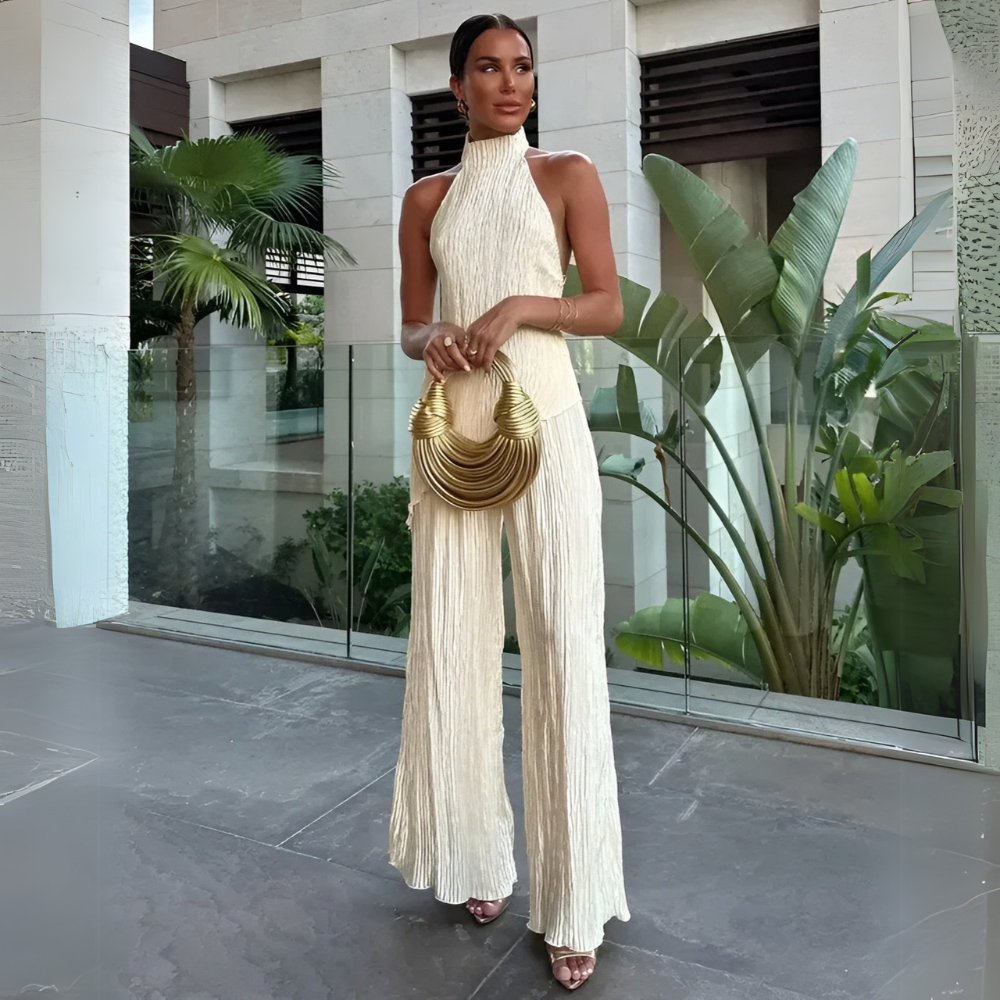 Elegant beige asymmetrical backless women's jumpsuit, perfect for evening wear & chic summer parties.