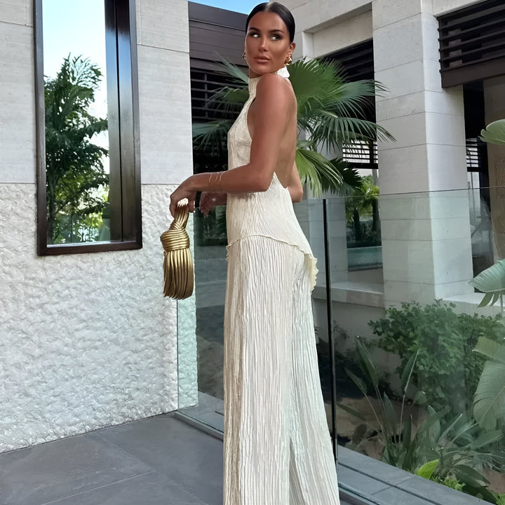 Chic women's backless asymmetrical jumpsuit in beige, ideal for special occasions & party outfits.